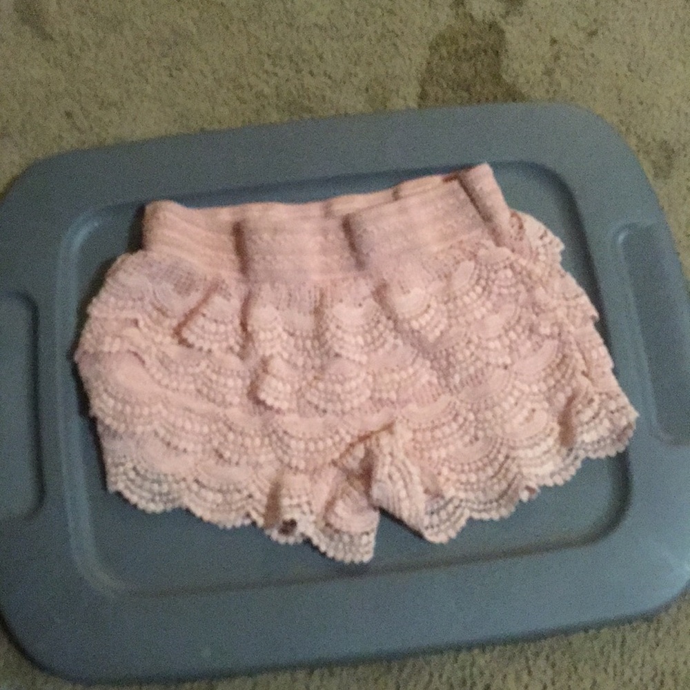 Pink with little holes in and stretchy top